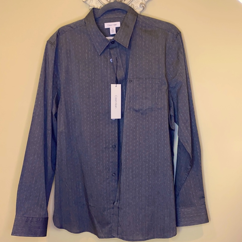 Calvin Klein button down shirt long sleeves. S-17
